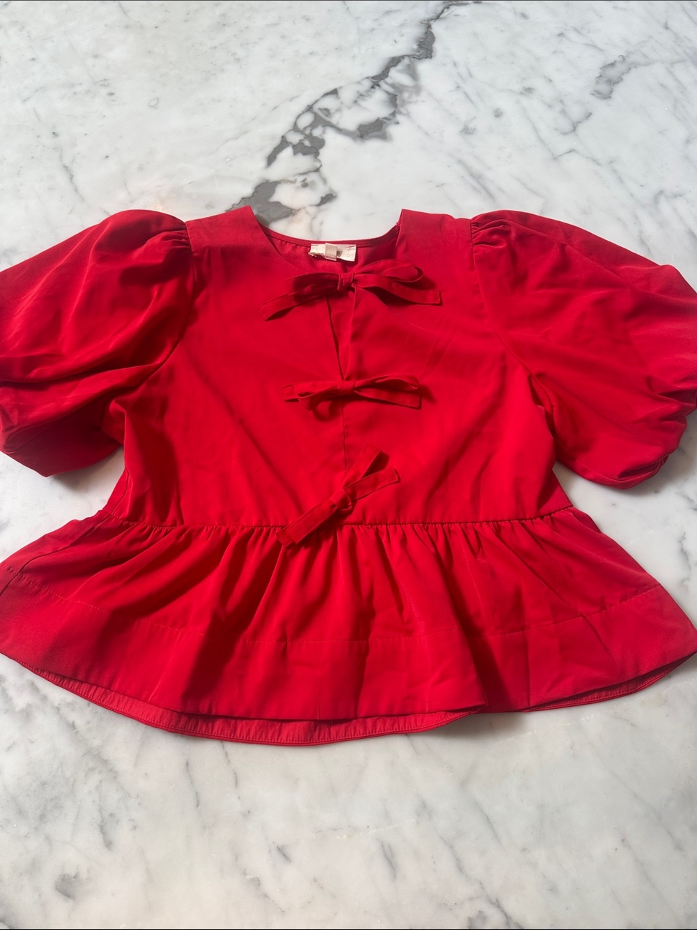 entro Peplum Bow Top